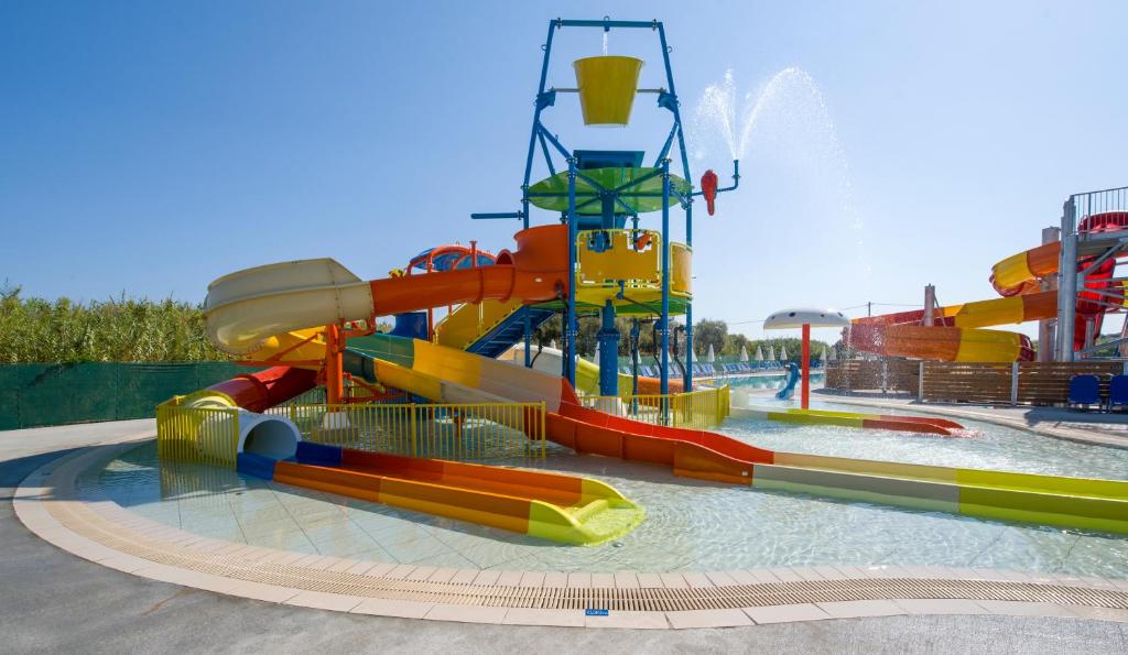a water park with a colorful water slide at Selini Suites & Waterpark in Kolymvari