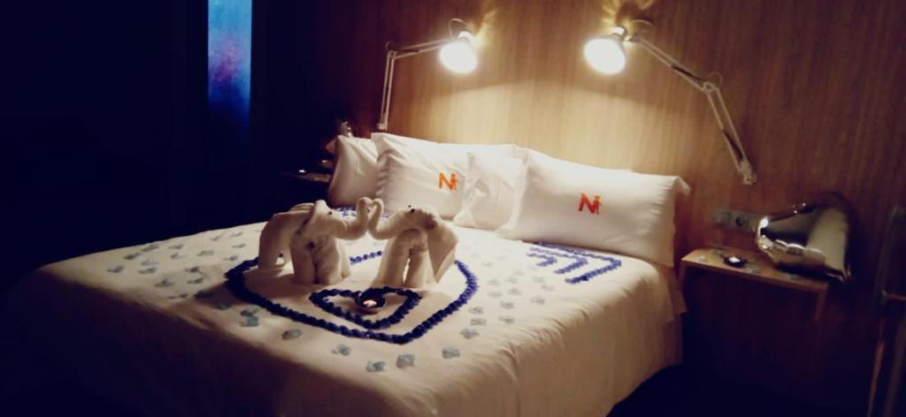 Voodi või voodid majutusasutuse Hotel Nomada toas