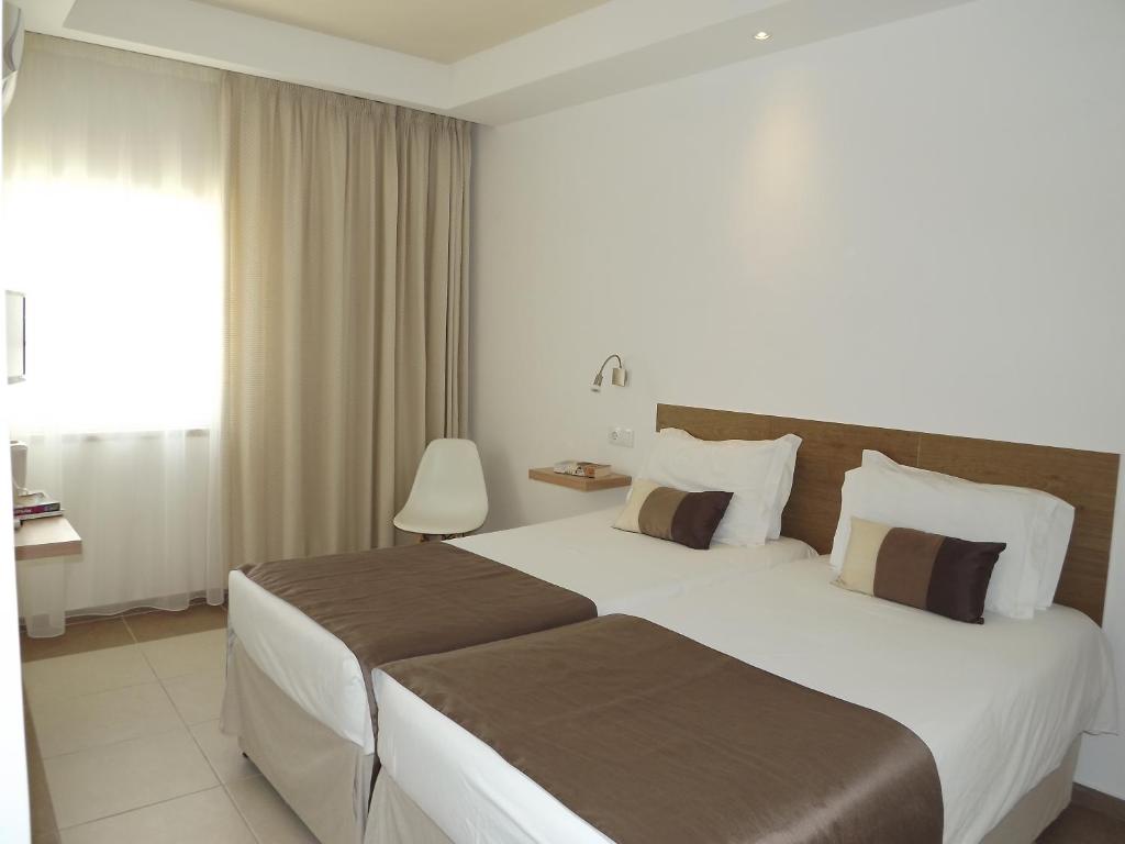 Uma cama ou camas num quarto em Hotel Mar Azul