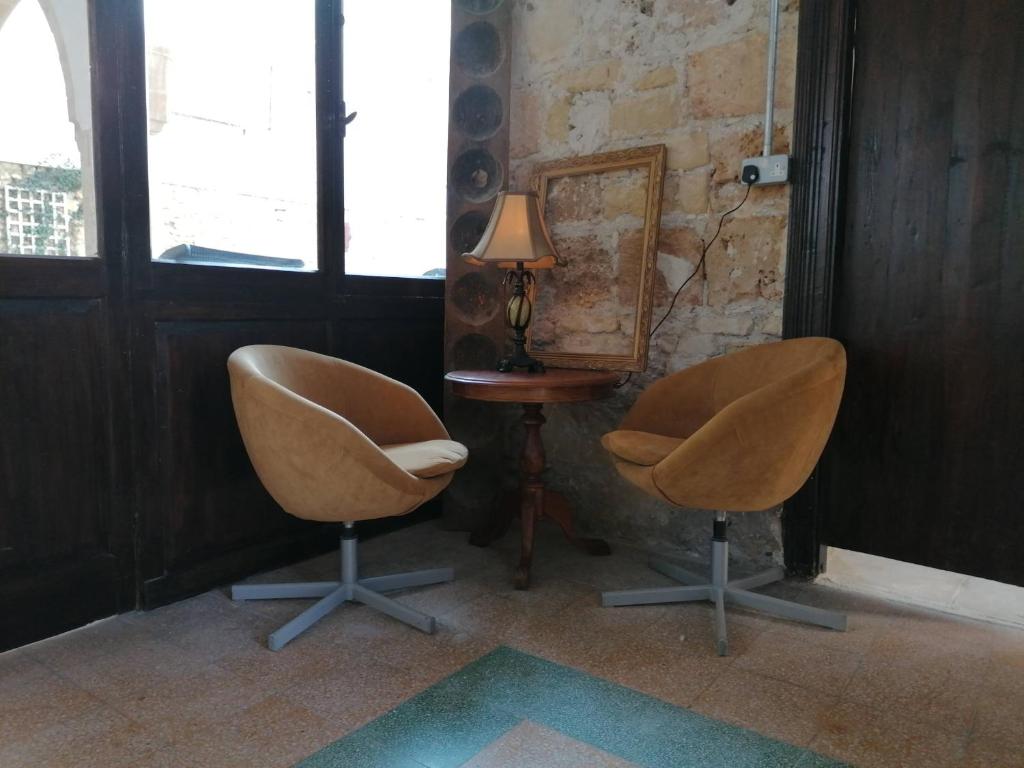 Posezení v ubytování Le Mat Hostel