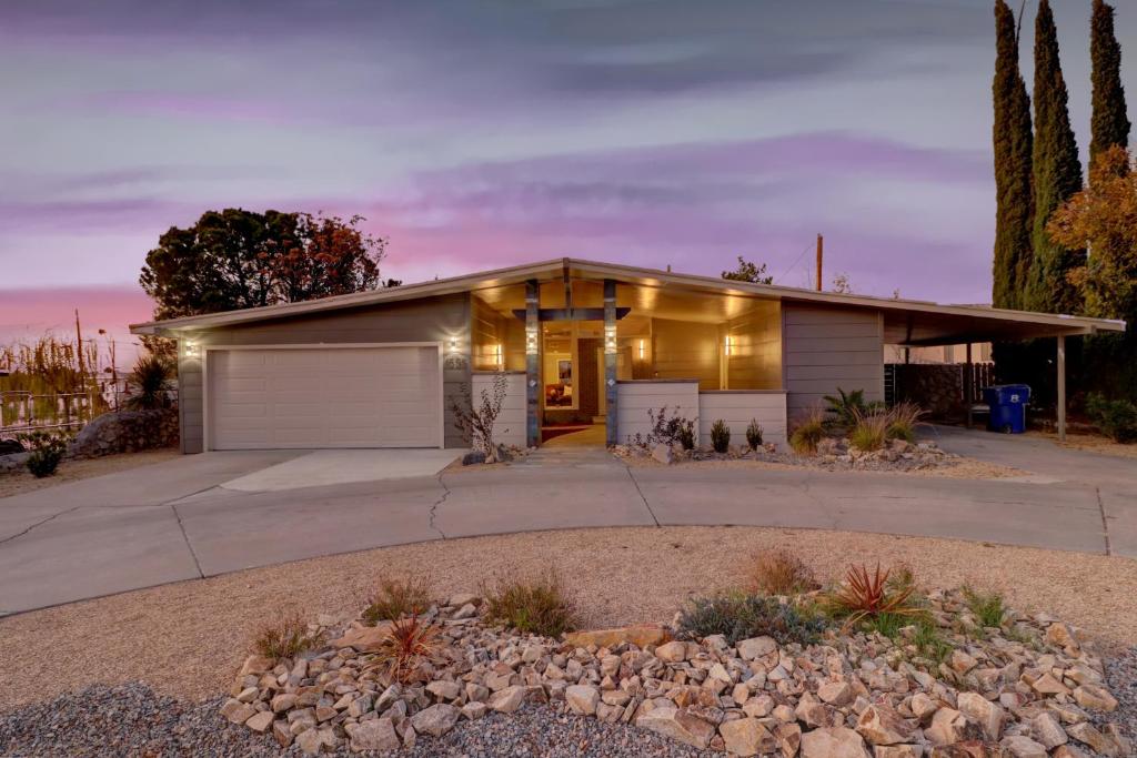 a house with a garage and a driveway at Sleek, Modern Designer home 3 in Las Cruces