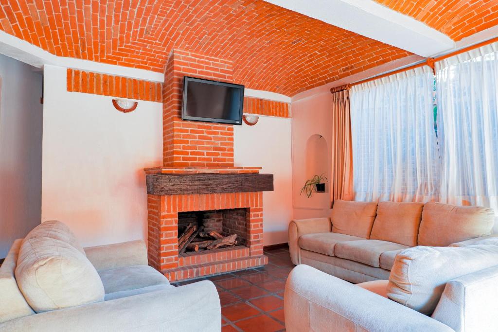 Posezení v ubytování Suites Paraiso Tequis
