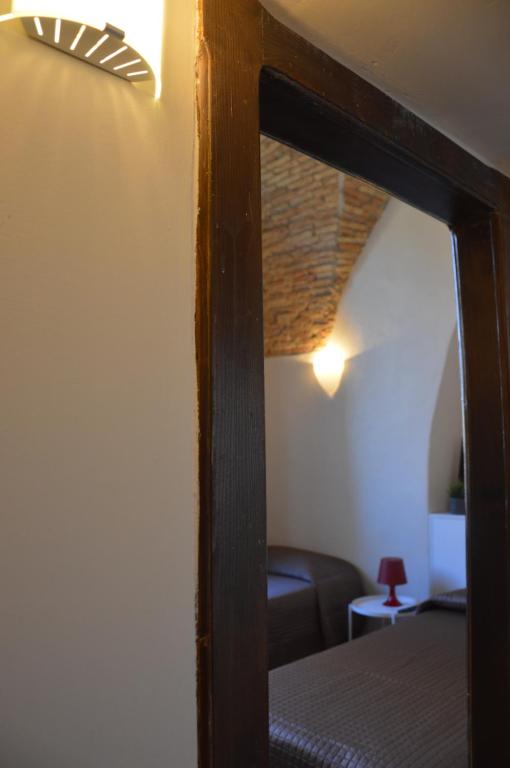 Łóżko lub łóżka w pokoju w obiekcie Dimora Sole Raggiante