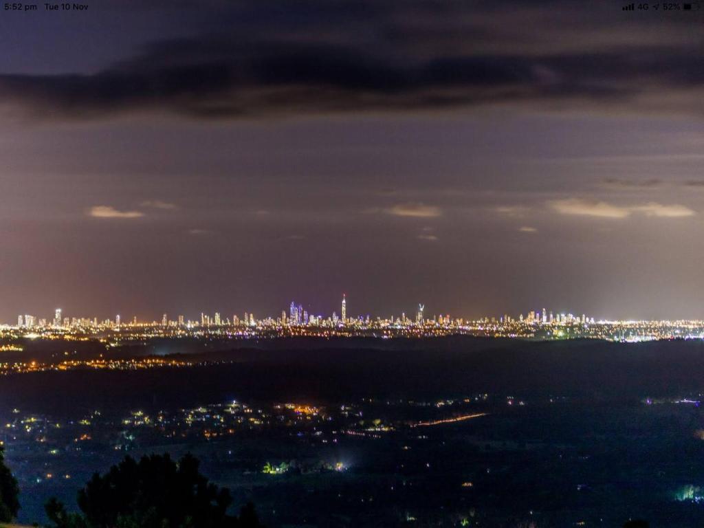 a view of a city at night at Tamborine Mountain Bed and Breakfast in Mount Tamborine