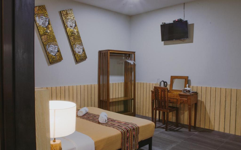 TV a/nebo společenská místnost v ubytování Borobudur Bed & Breakfast
