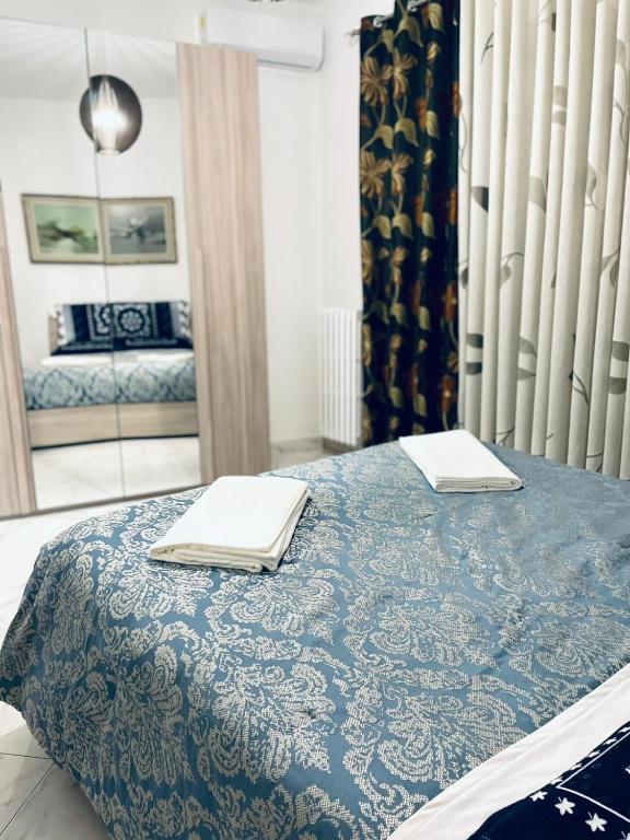 Posteľ alebo postele v izbe v ubytovaní CASA DEI FIORI