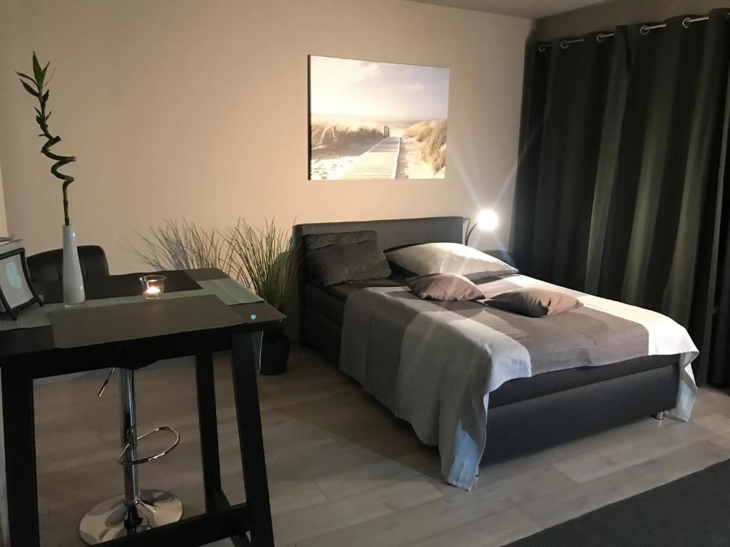 Postel nebo postele na pokoji v ubytování Schönes Apartment mit Balkon