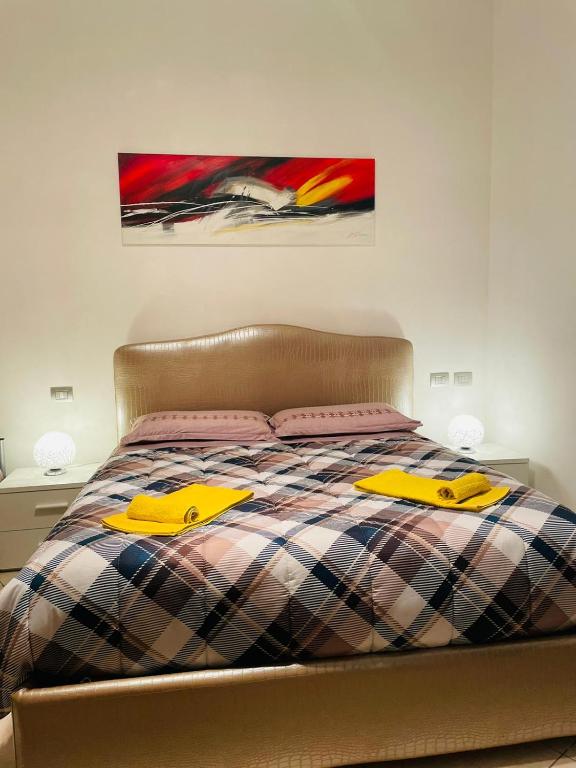 Postel nebo postele na pokoji v ubytování Casa Dei Fiori 3