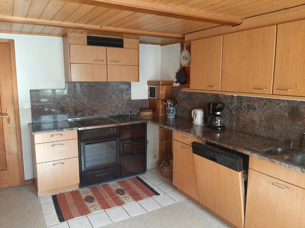Kuchyň nebo kuchyňský kout v ubytování Chalet Am Fels