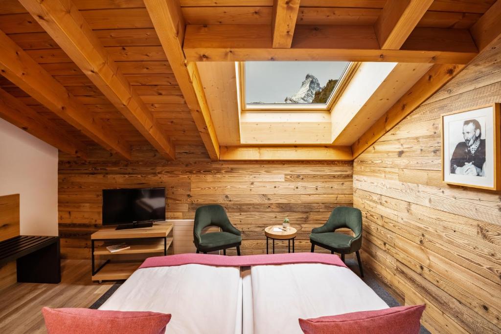 Postel nebo postele na pokoji v ubytování 22 Summits Apartments