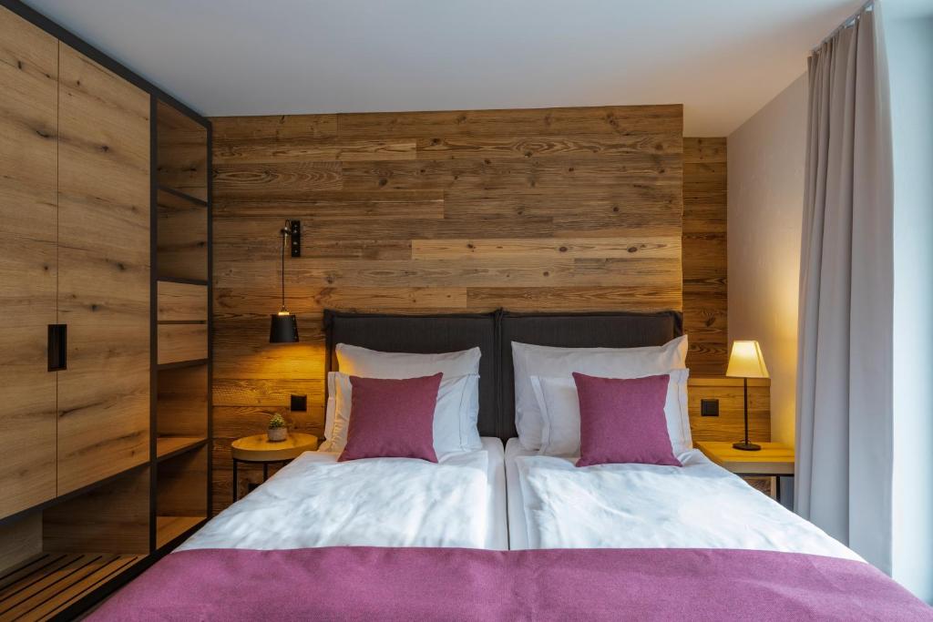 Postel nebo postele na pokoji v ubytování 22 Summits Apartments