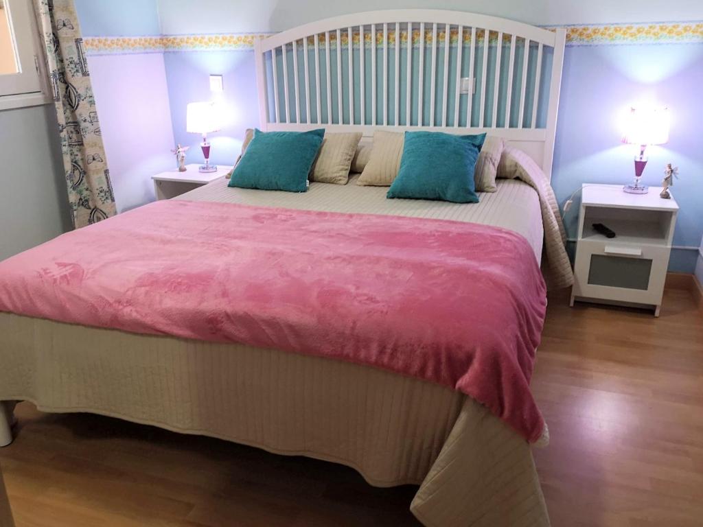 Een bed of bedden in een kamer bij Casa DE LAS HADAS