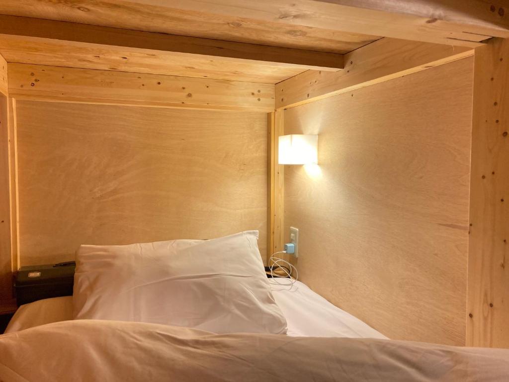 Postel nebo postele na pokoji v ubytování Guest House Preta Torami