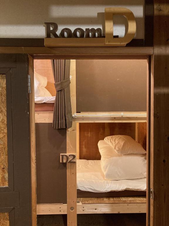 Postel nebo postele na pokoji v ubytování Guest House Preta Torami