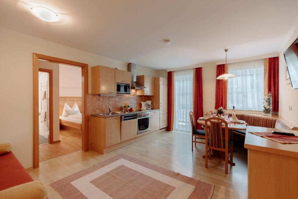 Kuchyň nebo kuchyňský kout v ubytování 4 Mountains Apartments