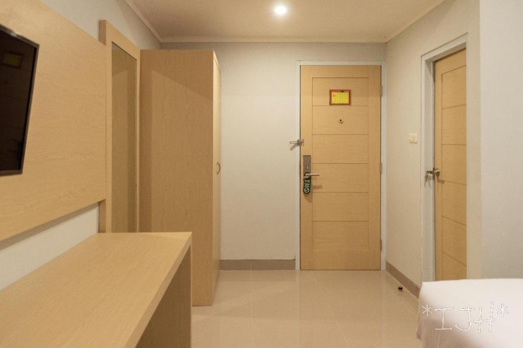 Postel nebo postele na pokoji v ubytování Mahakam24 Residence