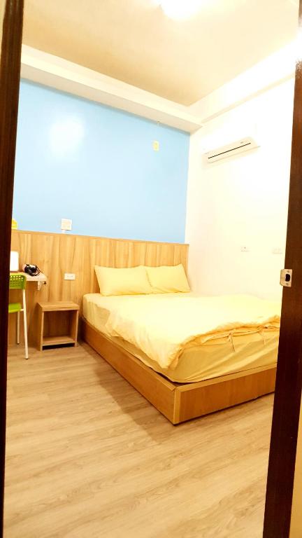 Postel nebo postele na pokoji v ubytování Get Grace Hotel