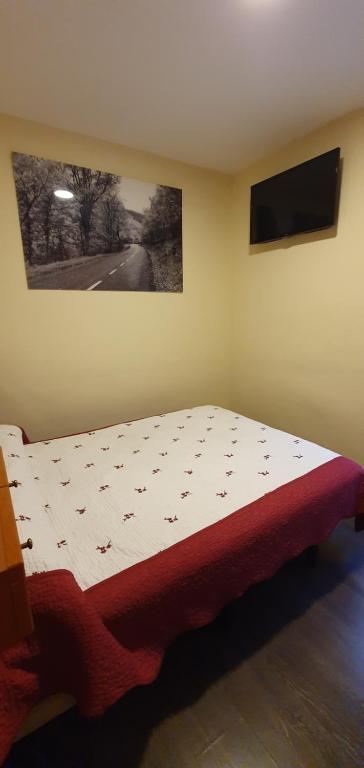 Postel nebo postele na pokoji v ubytování Hostal Moncloa