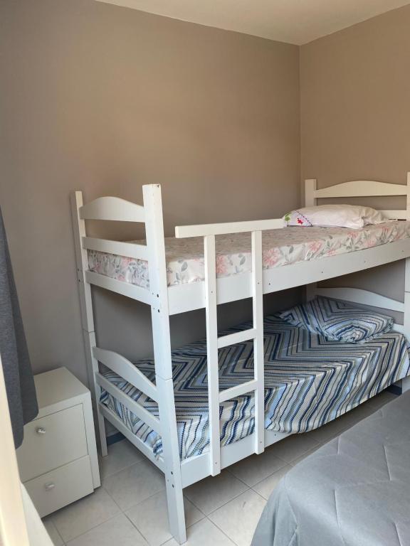  Apartamento pé na areia - sacada e churrasqueira - para até 6 pessoas