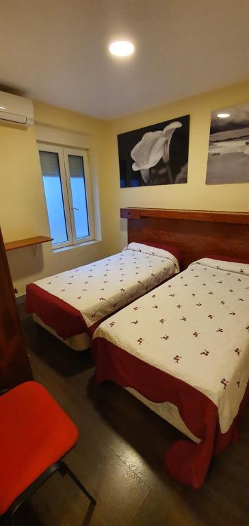 Postel nebo postele na pokoji v ubytování Hostal Moncloa