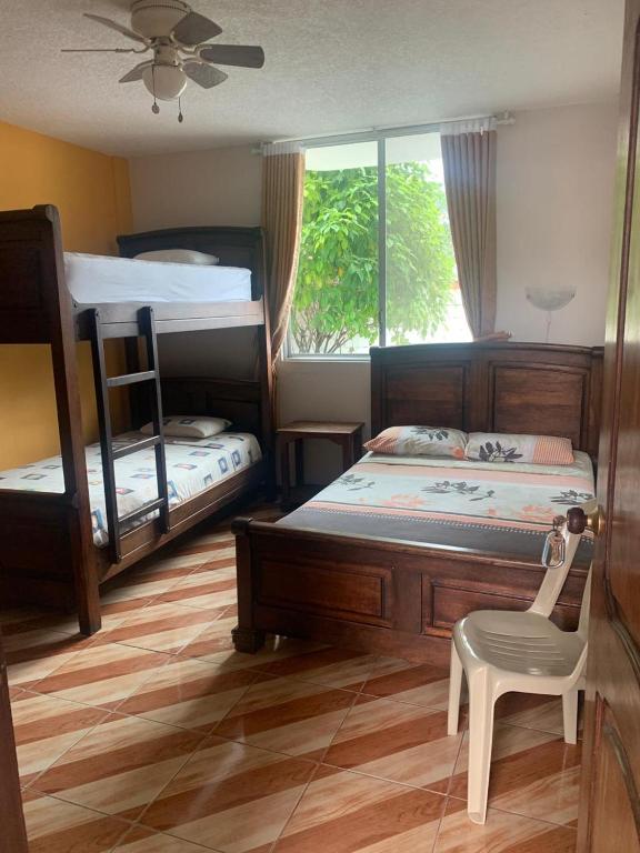 Postel nebo postele na pokoji v ubytování Hotel Kemarios
