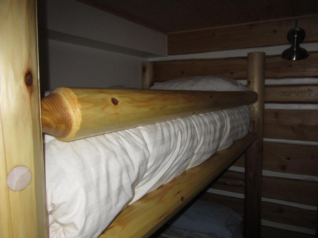 Postel nebo postele na pokoji v ubytování Log Inn & Pub