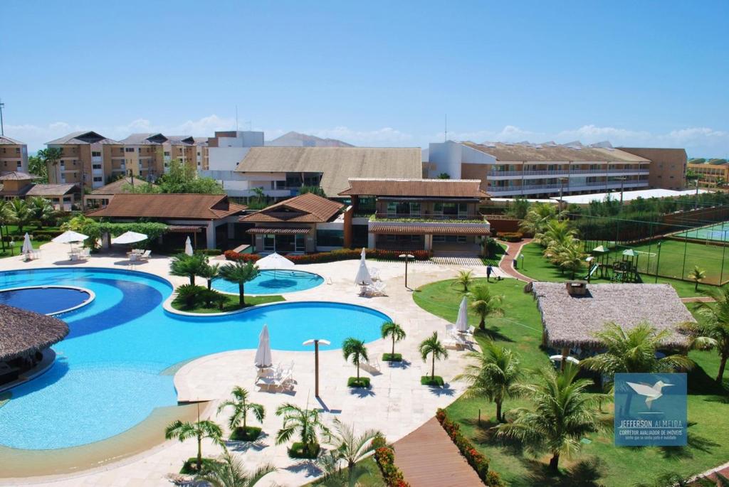 an aerial view of a resort with a pool at Vila do Porto Resort - Charme e Conforto! in Aquiraz