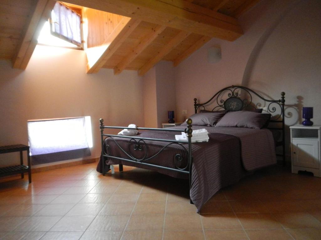 Postel nebo postele na pokoji v ubytování La Cascina del Sole