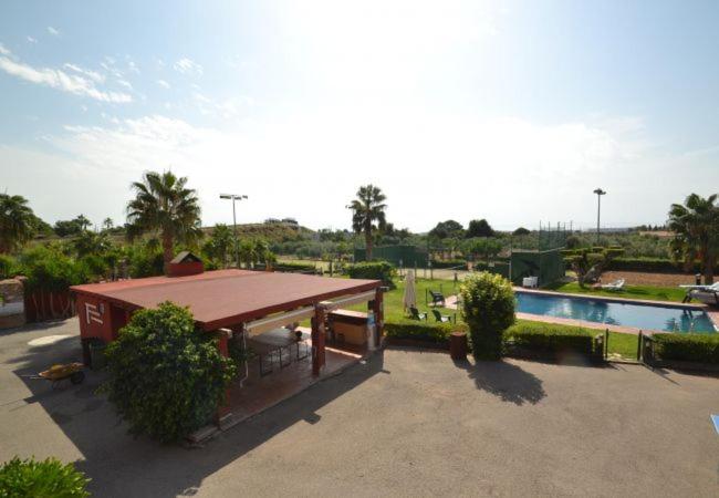 Bazén v ubytovaní Villa Finca Escalicha alebo v jeho blízkosti