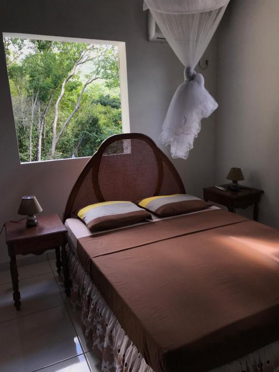 Postel nebo postele na pokoji v ubytování villa vue sur mer