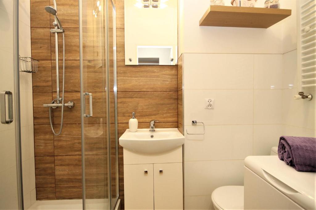 Kúpeľňa v ubytovaní Apartament Lawendowy