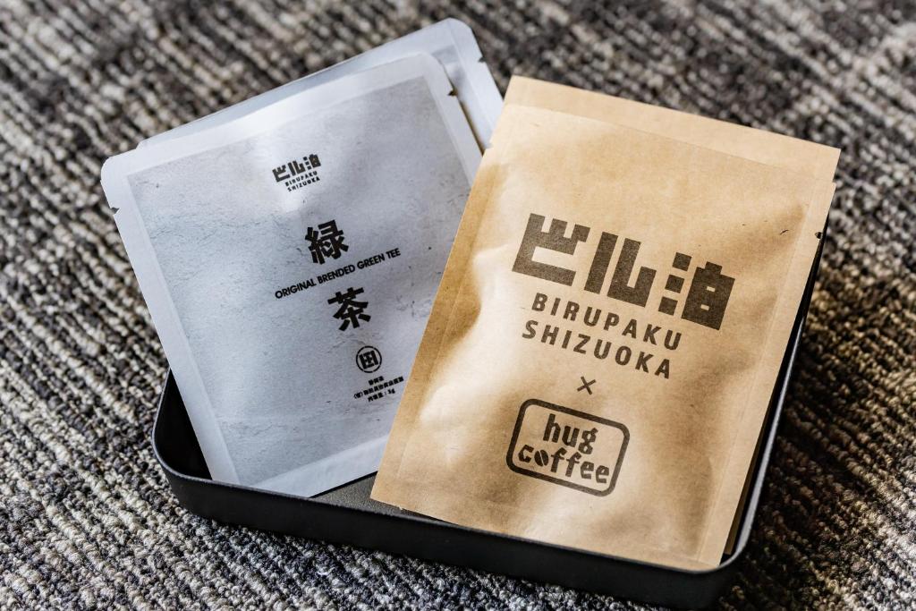 ビル泊 -Birupaku Decentralized Hotel-に飾ってある許可証、賞状、看板またはその他の書類