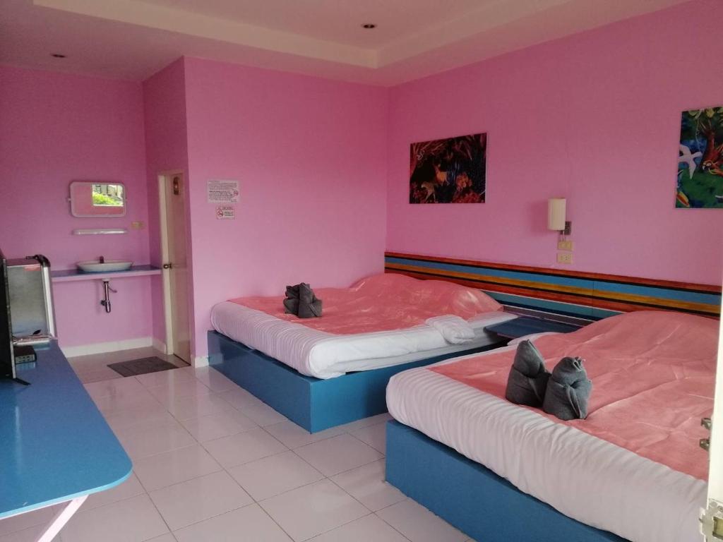 Postel nebo postele na pokoji v ubytování Koh Chang Baanrimtalay