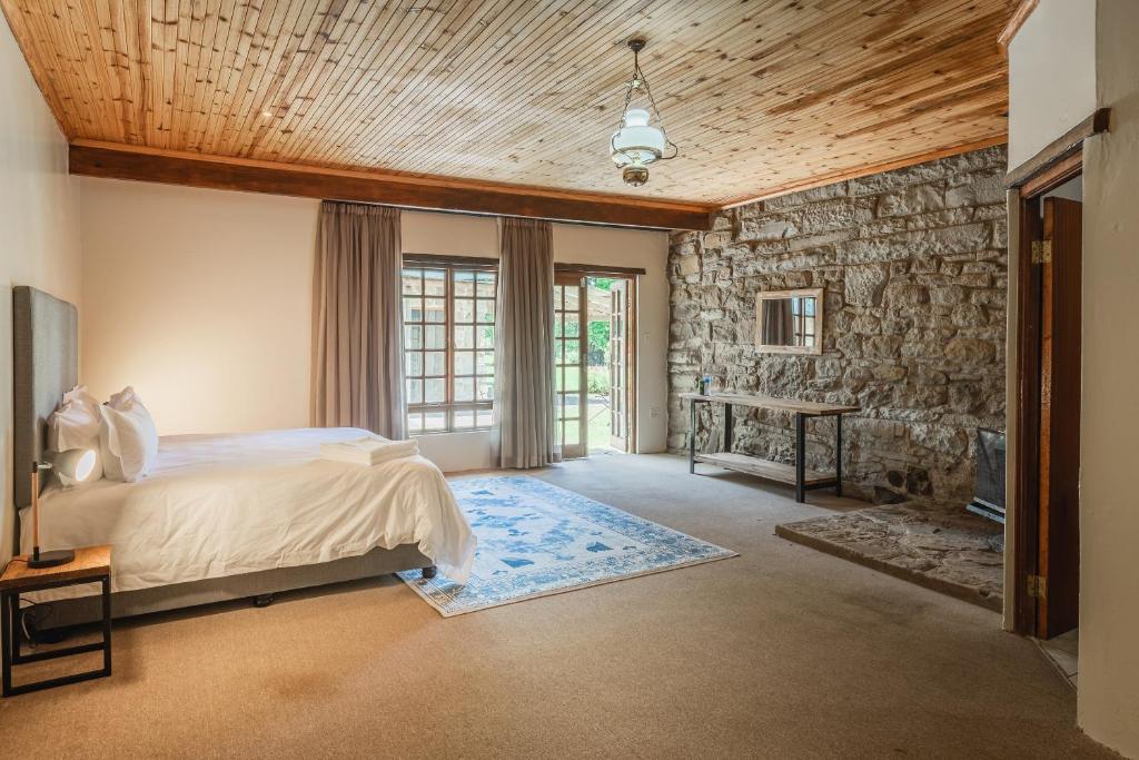 Postel nebo postele na pokoji v ubytování Penwarn Farm Lodge