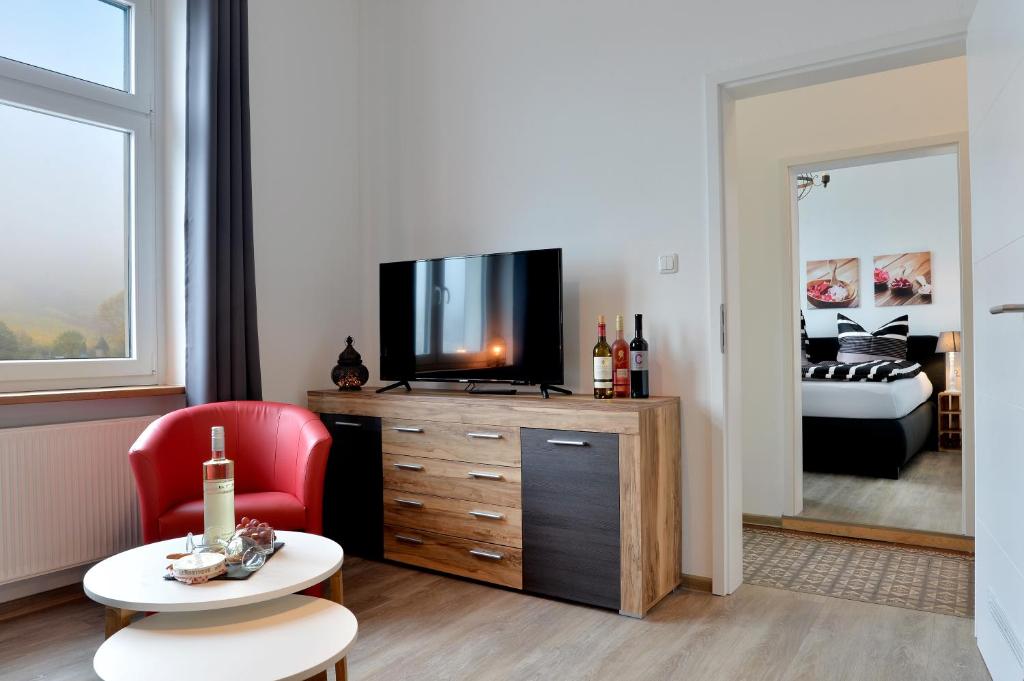 TV a/nebo společenská místnost v ubytování Ferienhaus Maja