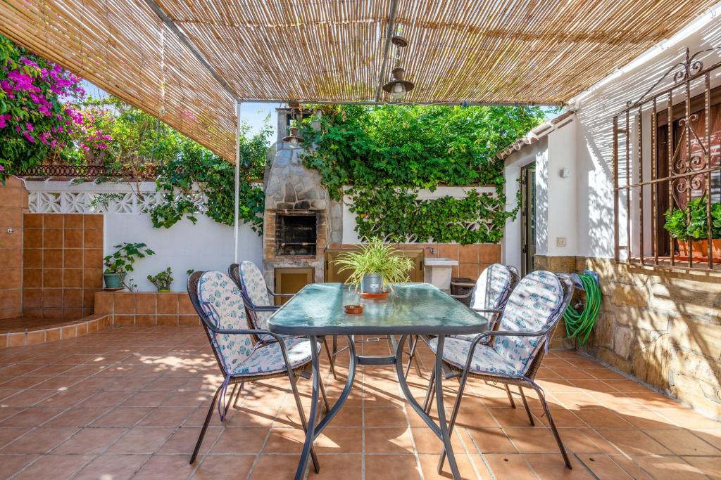 A patio or other outdoor area at Charming house with sea view, Nerja and private pool