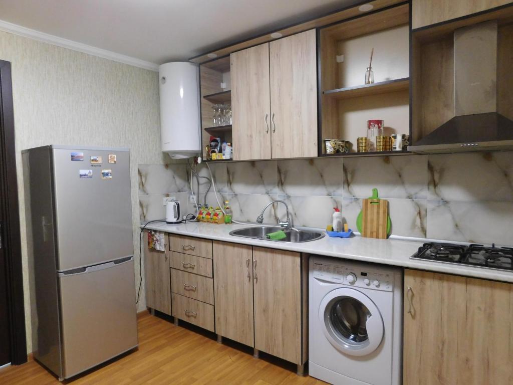 Kuchyň nebo kuchyňský kout v ubytování Akaki's Guesthouse