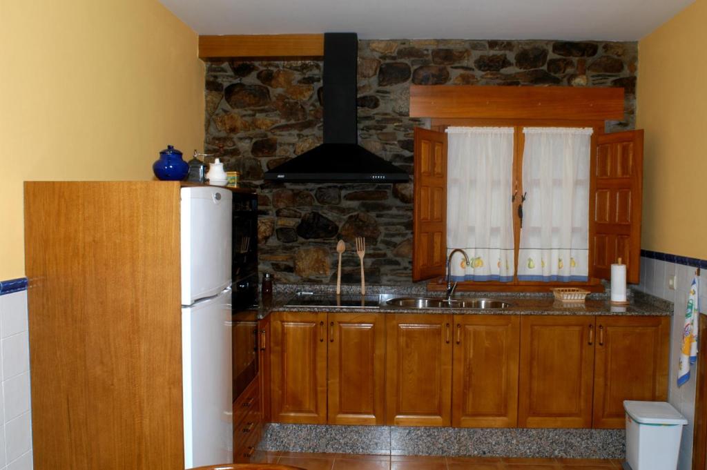 Kuchyň nebo kuchyňský kout v ubytování Casa Xuaquin