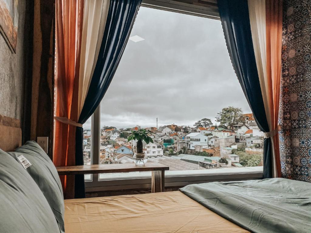 Postel nebo postele na pokoji v ubytování Ô Cửa Mùa Thu