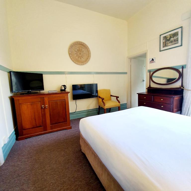 Postel nebo postele na pokoji v ubytování Point Lonsdale Guest House