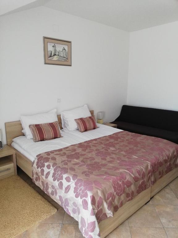 Postel nebo postele na pokoji v ubytování Hotel Amarilis