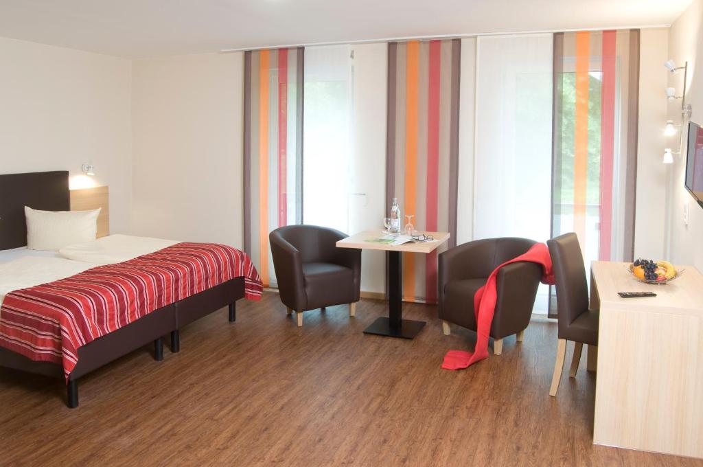 Postel nebo postele na pokoji v ubytování Hotel Hauer