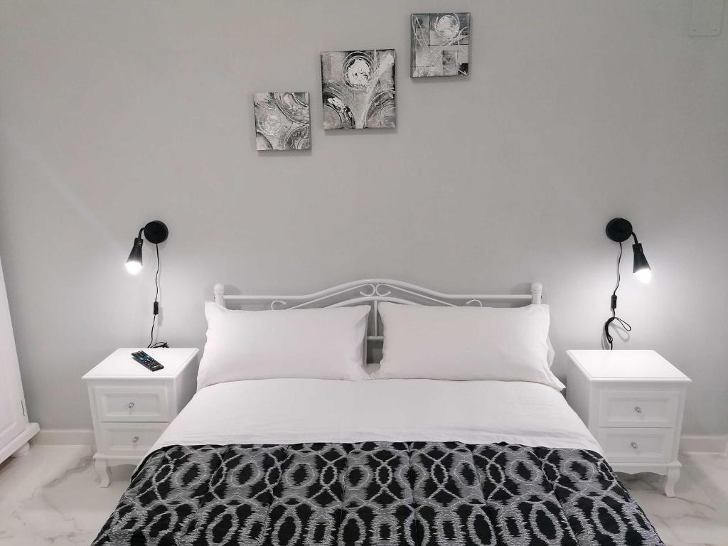 Postel nebo postele na pokoji v ubytování B&B WHITE HOUSE