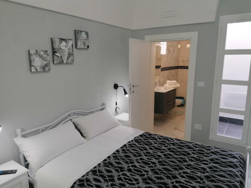 Postel nebo postele na pokoji v ubytování B&B WHITE HOUSE