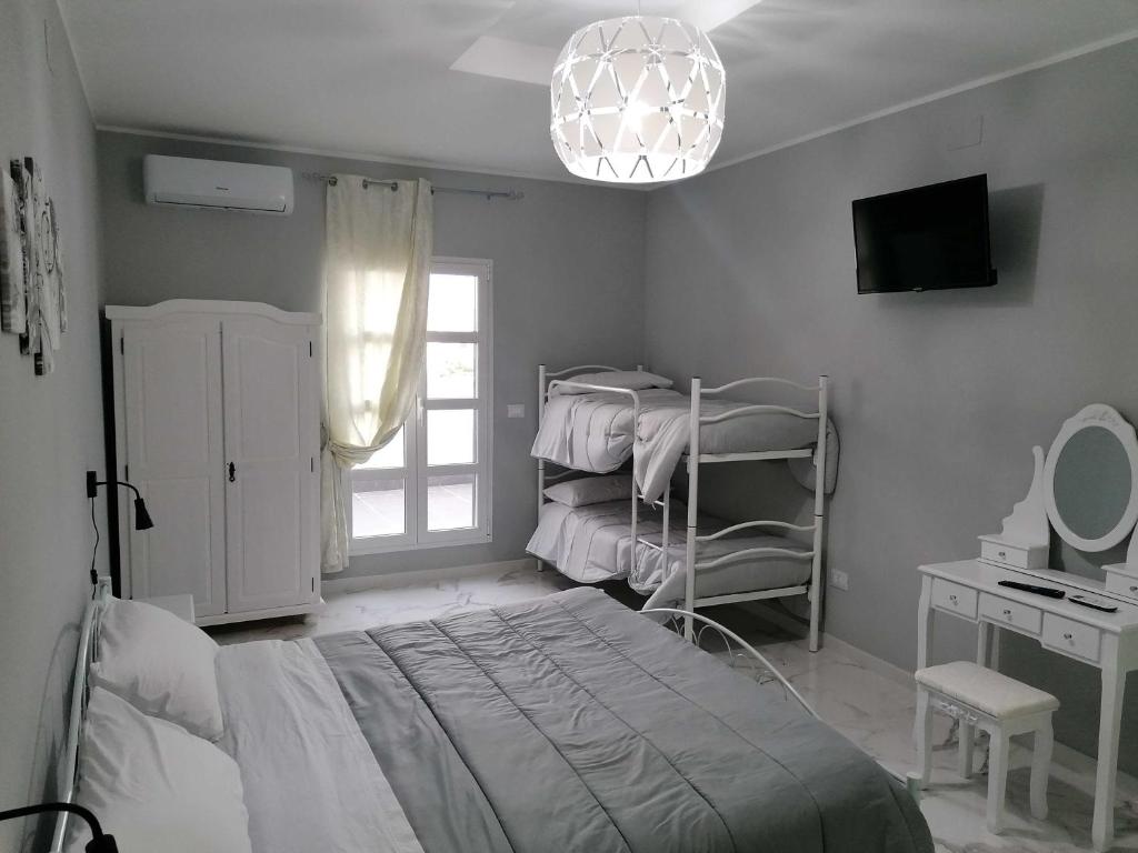 Postel nebo postele na pokoji v ubytování B&B WHITE HOUSE