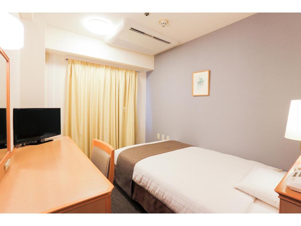 TV a/nebo společenská místnost v ubytování Smile Hotel Wakayama