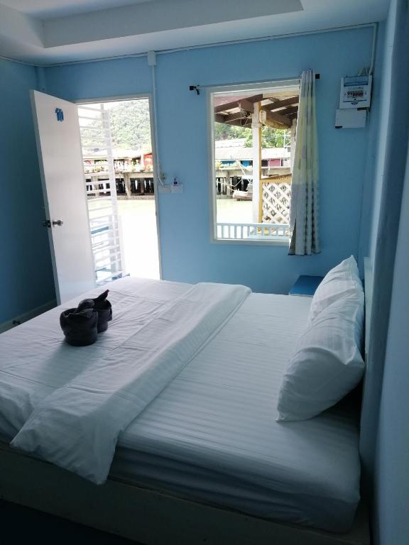 Postel nebo postele na pokoji v ubytování Koh Chang Baanrimtalay
