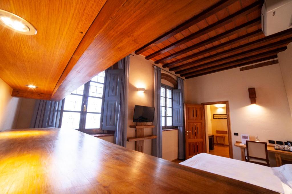 Postel nebo postele na pokoji v ubytování Agriturismo Cascina Farisengo