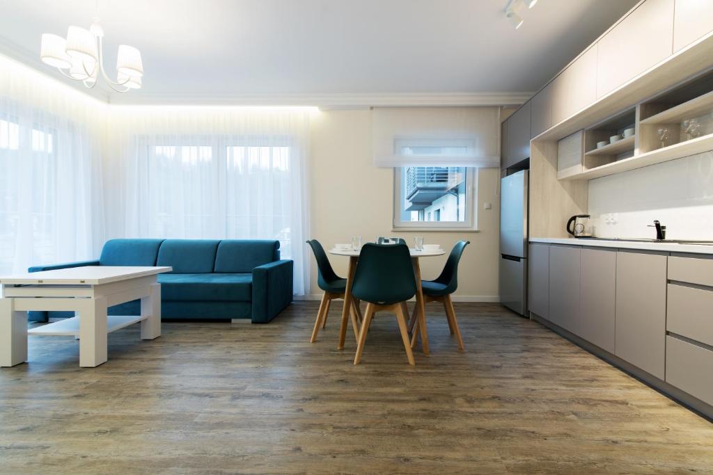 Kuchyň nebo kuchyňský kout v ubytování Apartamenty Spokojna 24C