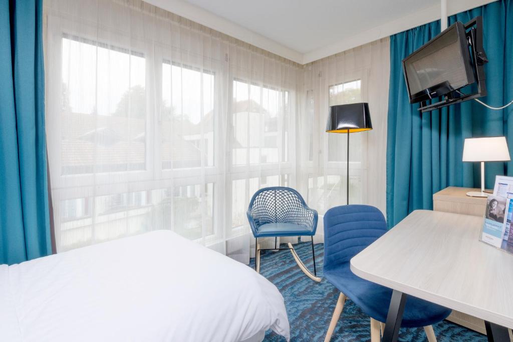 Postel nebo postele na pokoji v ubytování Mercure Lenzburg Krone